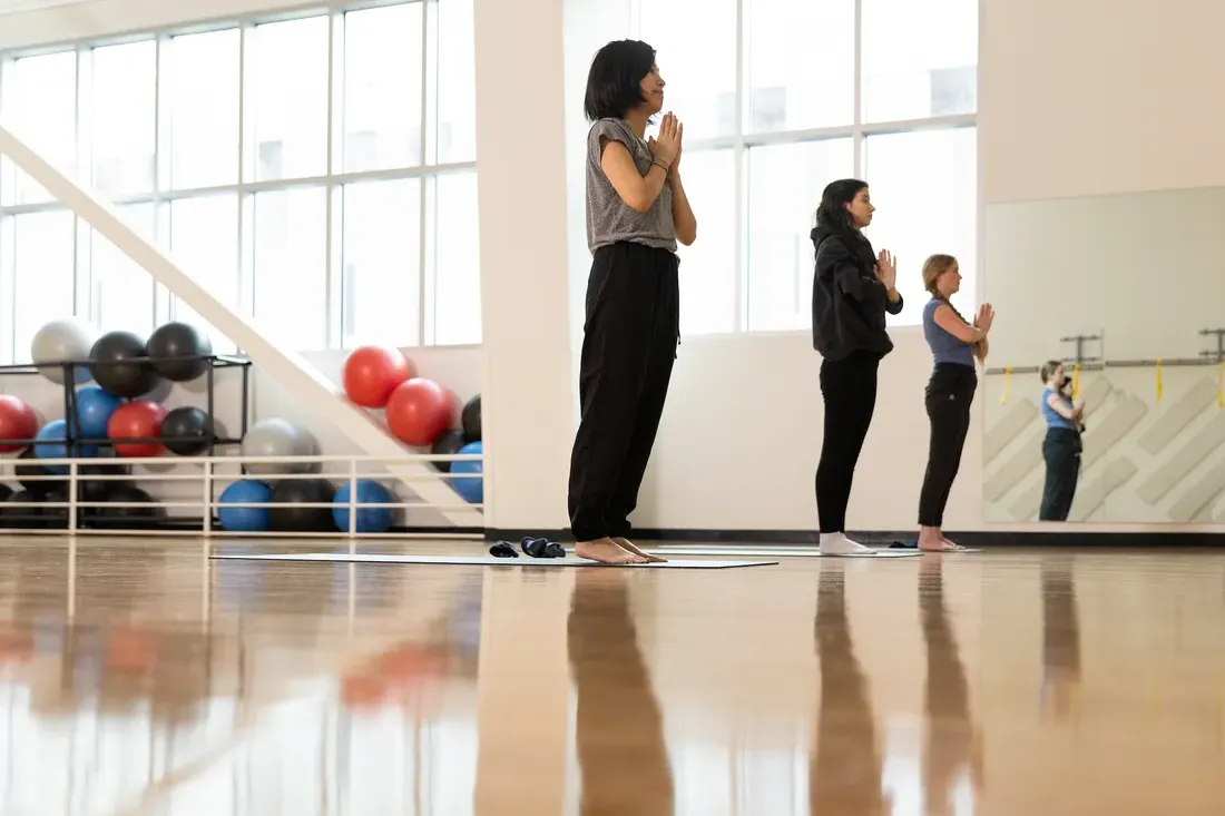 Students doing yoga.